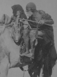 Old man on a camel chair